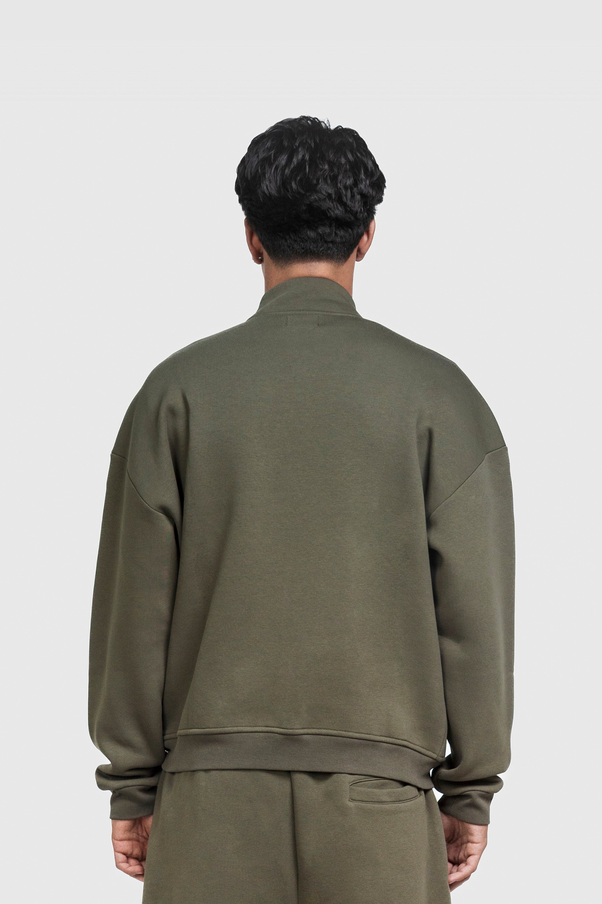 BASIC HIGH NECK ZIP OLIVE